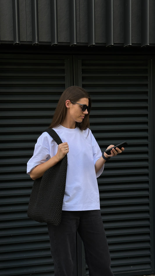 Didelė rankomis nerta rankinė